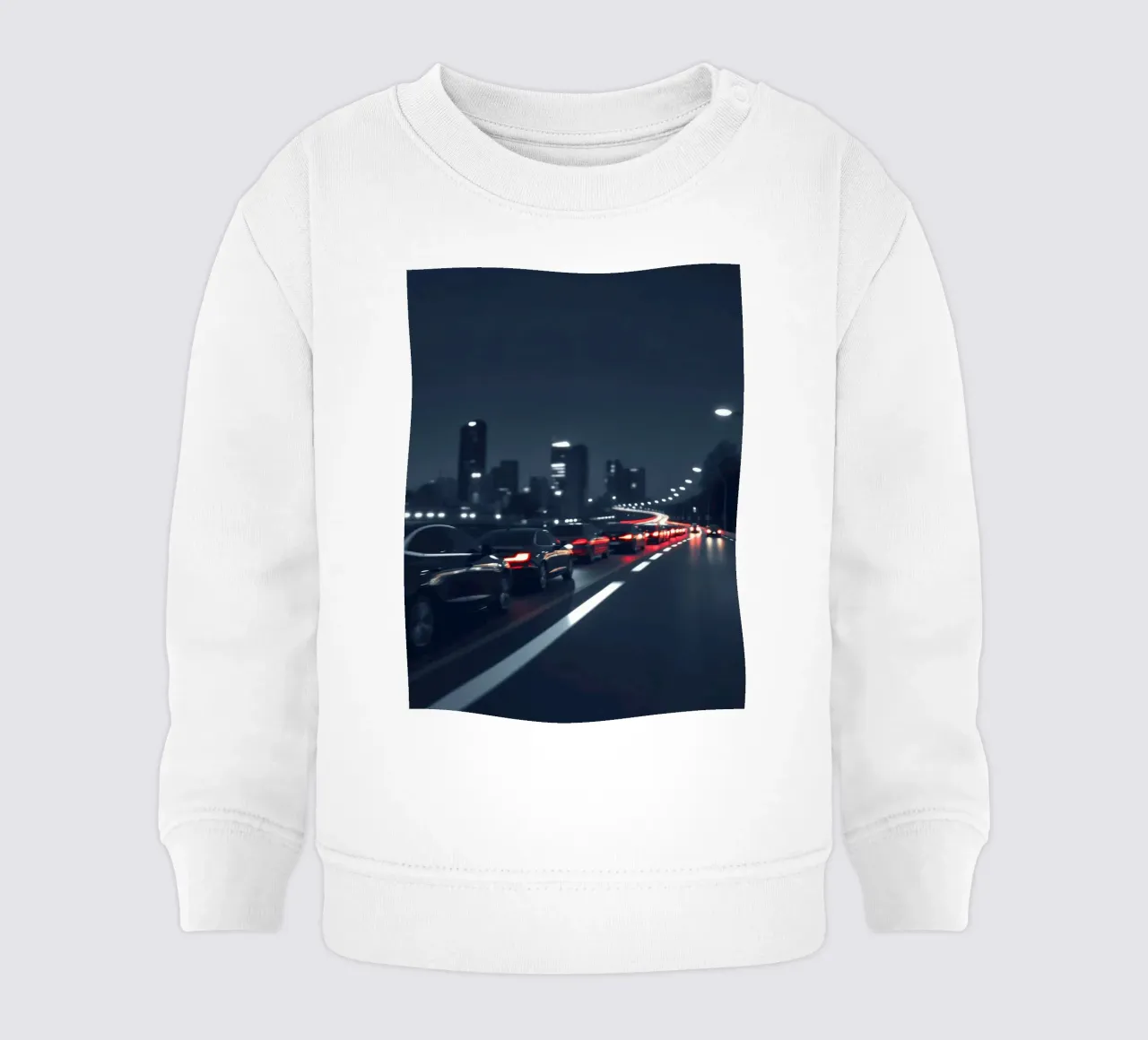 Traffic moving through a city highway at nigh felpa neonato da DesignDoodle