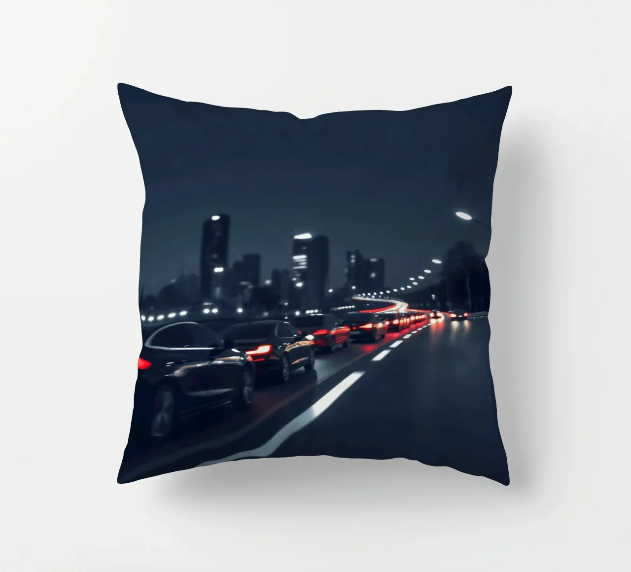 Traffic moving through a city highway at nigh cuscino da DesignDoodle