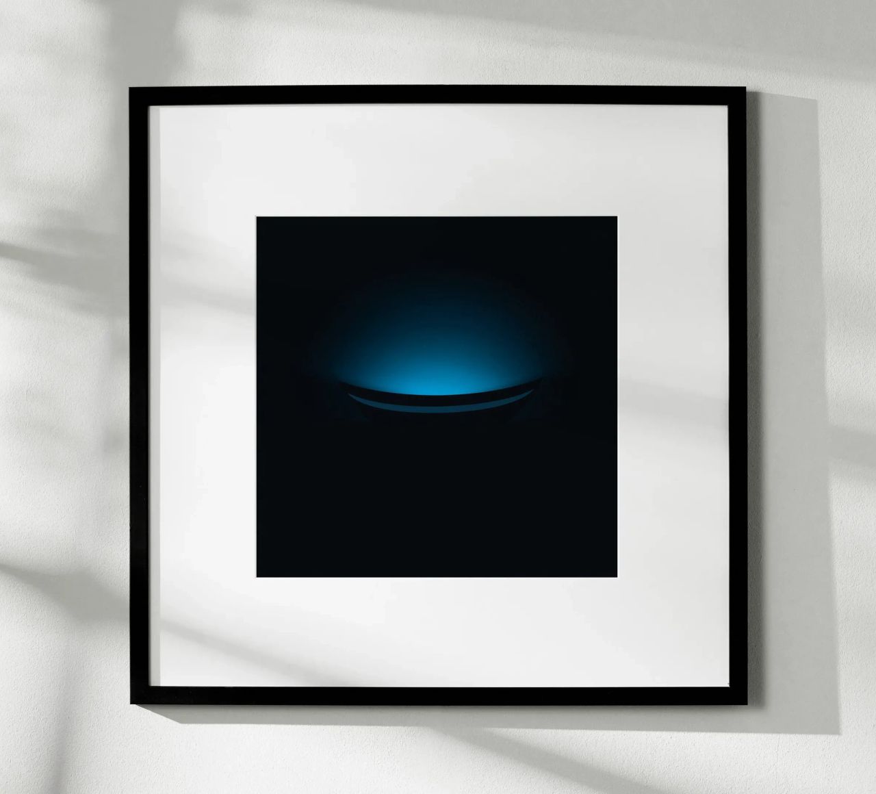Subtle blue glow illuminating a curved surface in a dark set poster by DesignDoodle