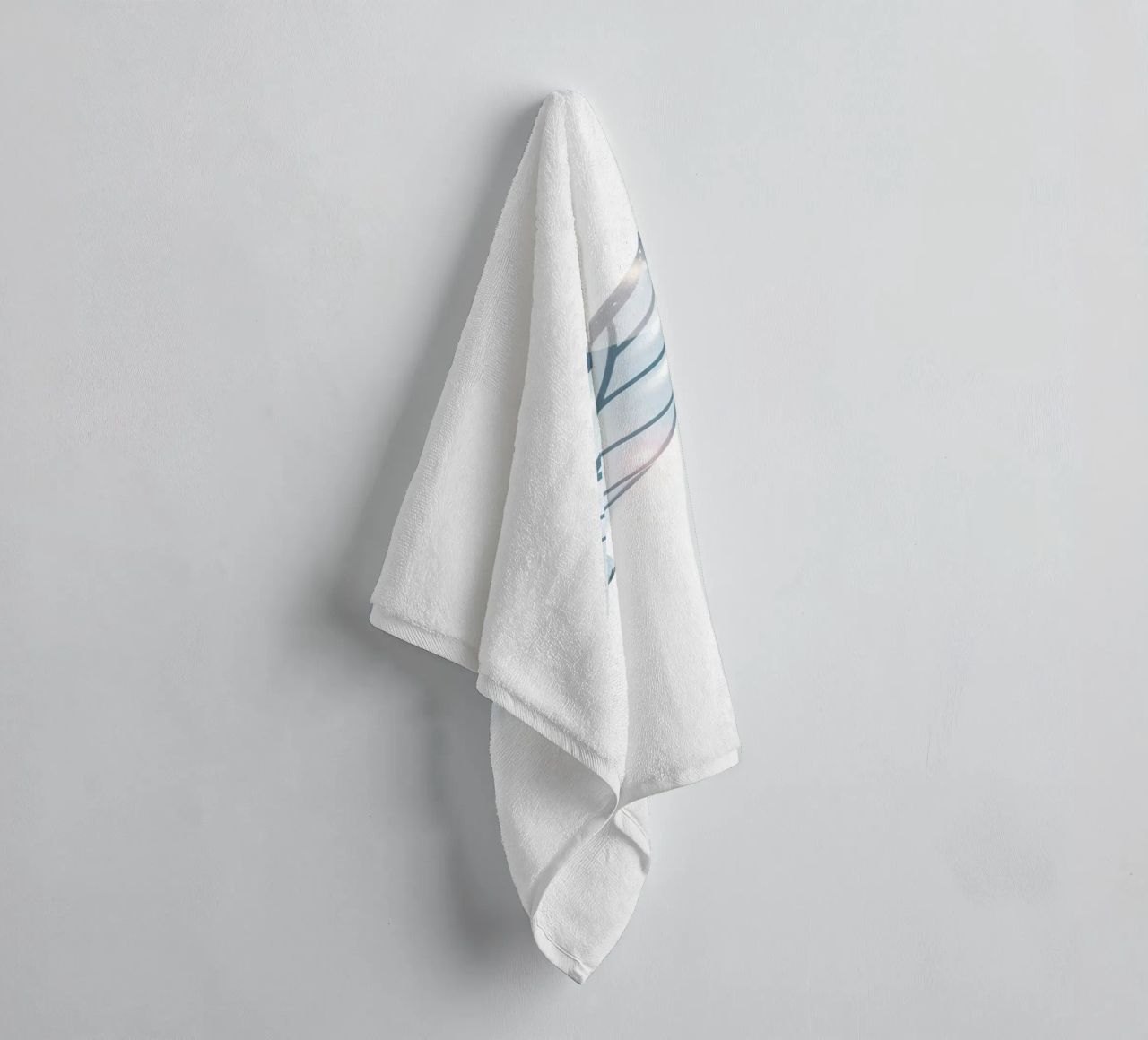 Elegant water droplet resting on a delicate leaf design agai towel by DesignDoodle